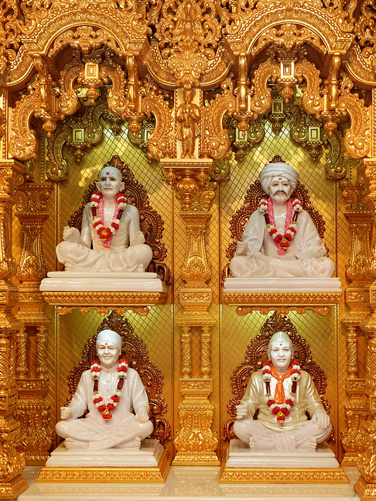 Top Left, Brahmaswarup Krishnaji Ada, Top Right Brahmaswarup Jaga Swami, Bottom Left Brahmaswarup Pappaji and Bottom Right Brahmaswarup Kakaji