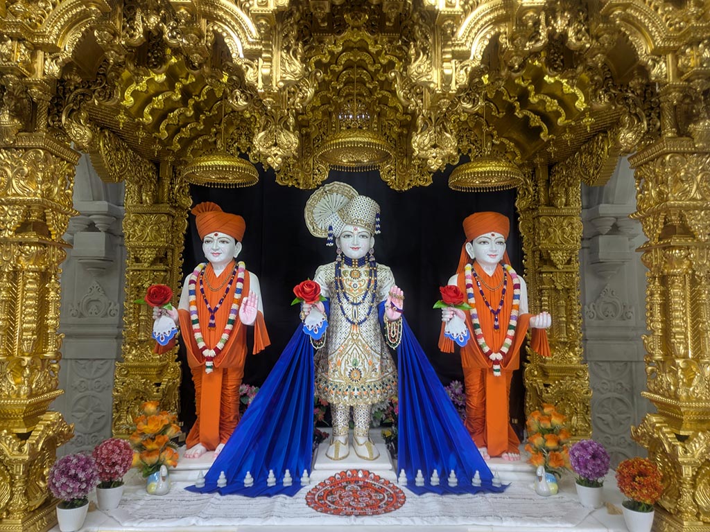 In Centre, Poorna Purushottam Shree Sahajanand Swami Maharaj, On Left Anadi Mul Akshar Murti Shree Gunatitanand Swami and On Right Anadi Mahamukta Shree Gopalanand Swami